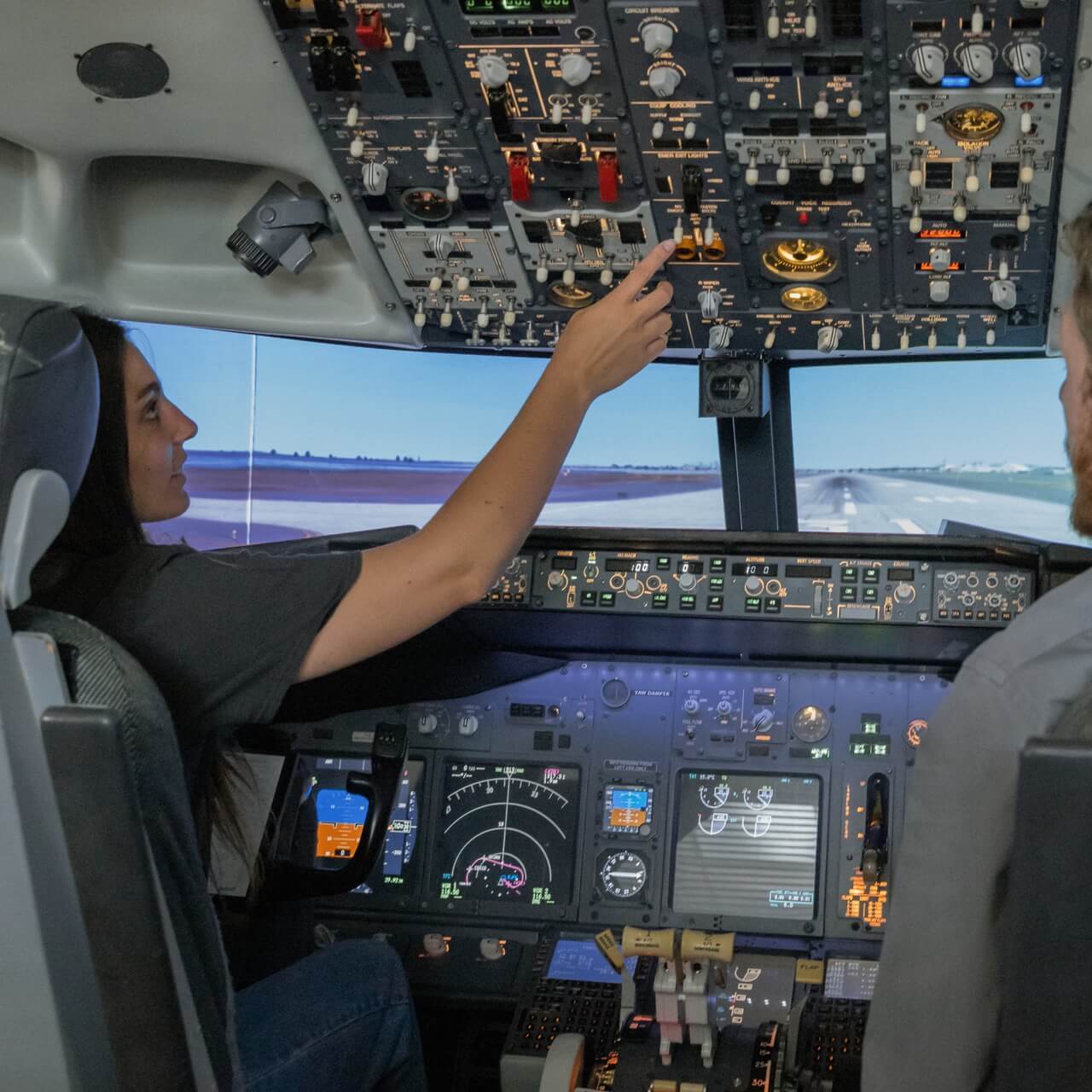 Aviation student in cockpit of an airplane