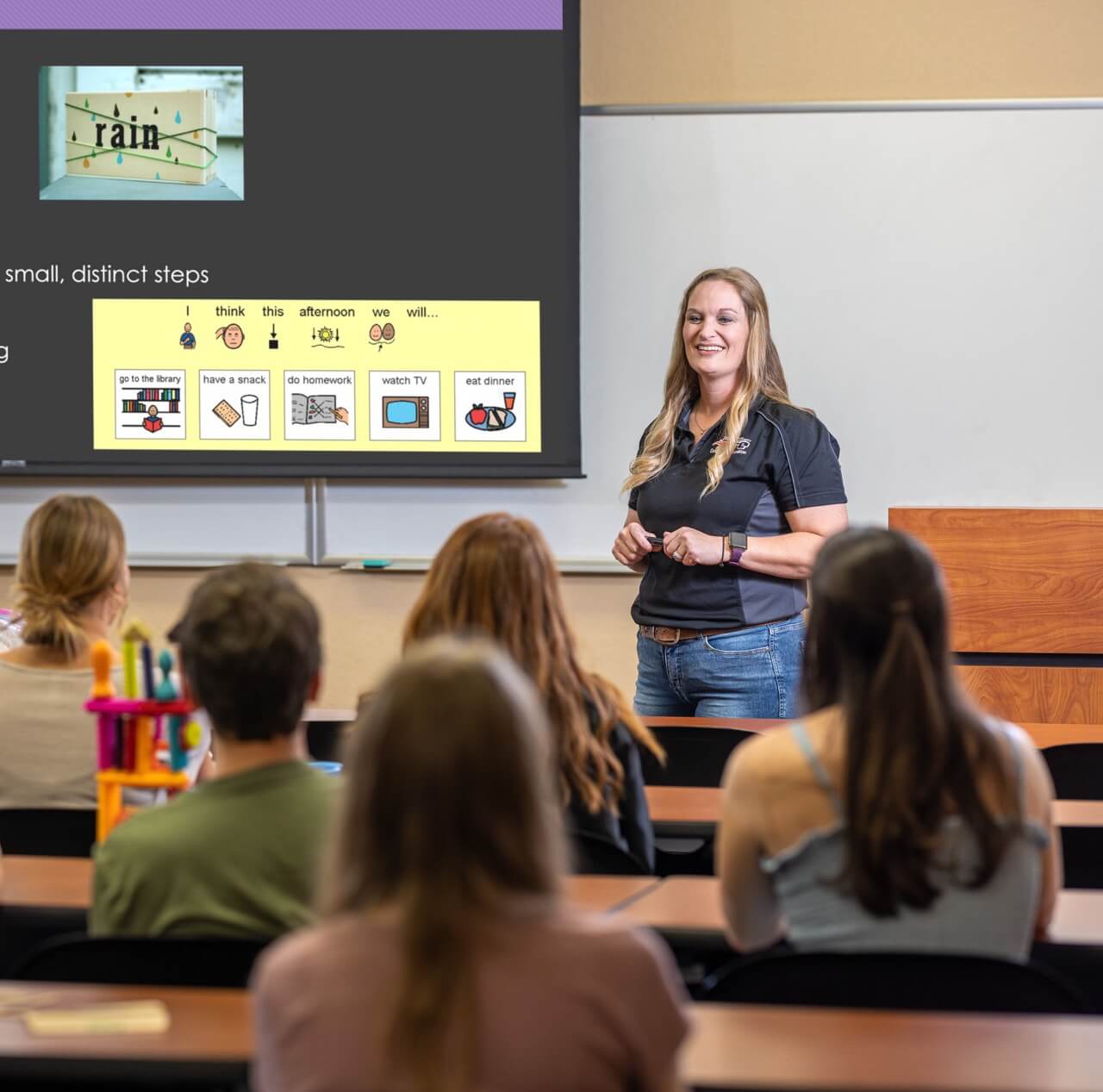 Education professor instructing class