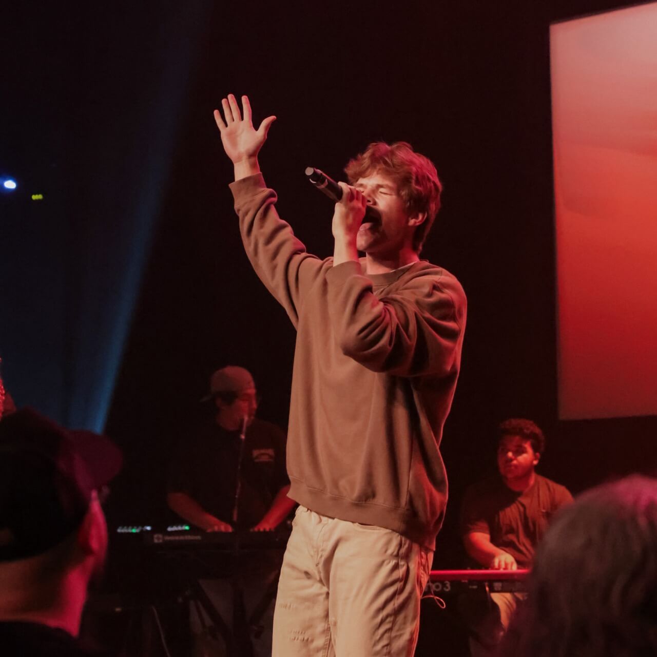 Student leading worship at an SEU Chapel service