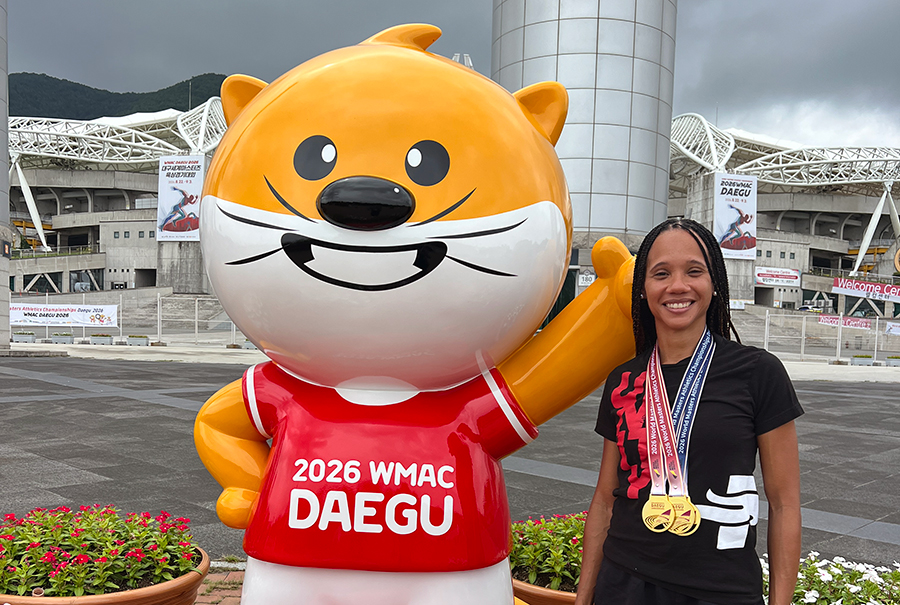 Latasha Dodson posing for a picture at WMA World Athletics