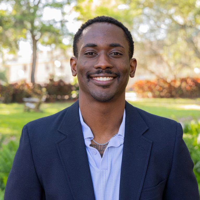 Headshot of a man outside