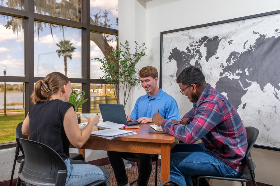 Students sitting at a table studying