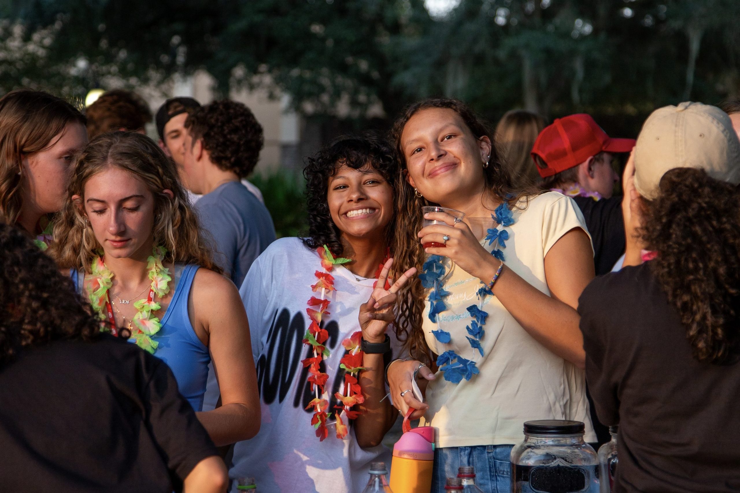 Two SEU students in a crowd at a campus event